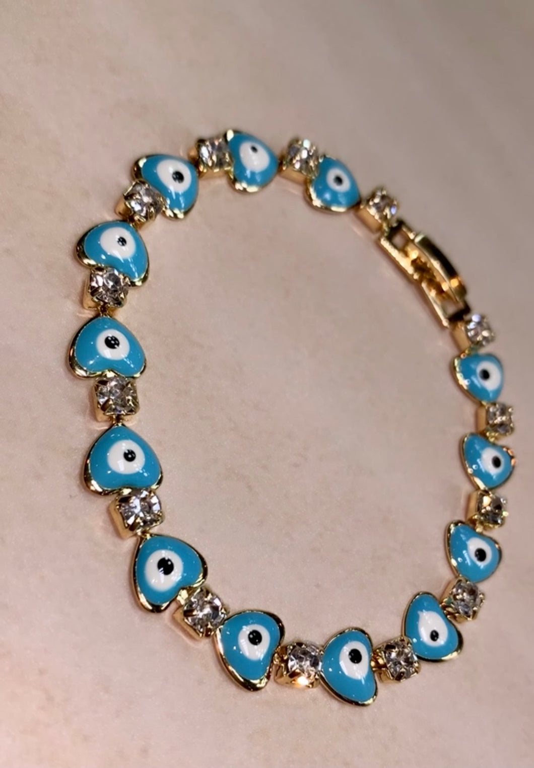 Light blue, evil eyes 🧿